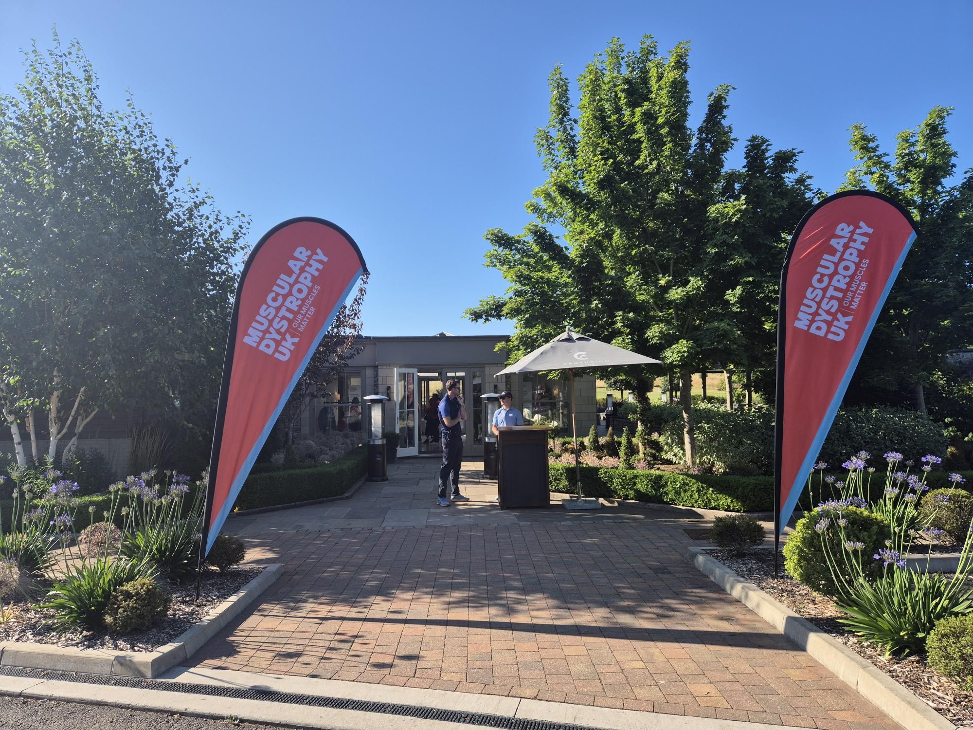 Entrance to Centurion Club with Muscular Dystrophy UK event flags